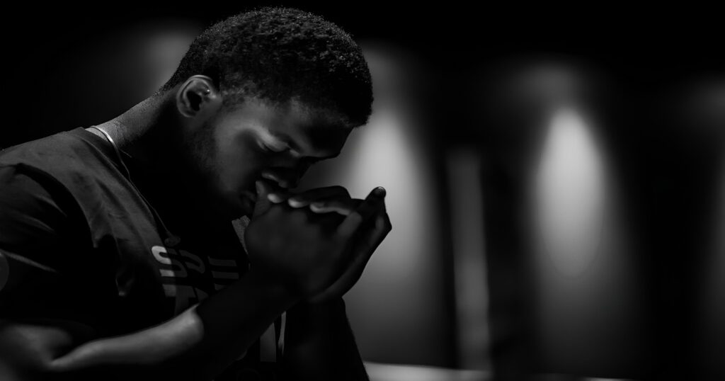 Image of a man praying