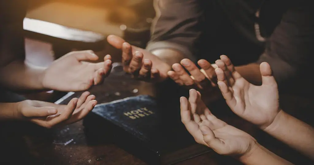 Image of people praying together